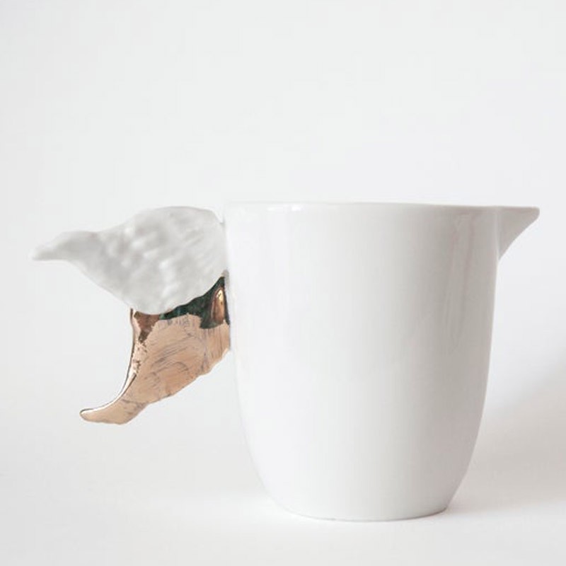 WINGED TEA CUP DECORATED WITH GOLD